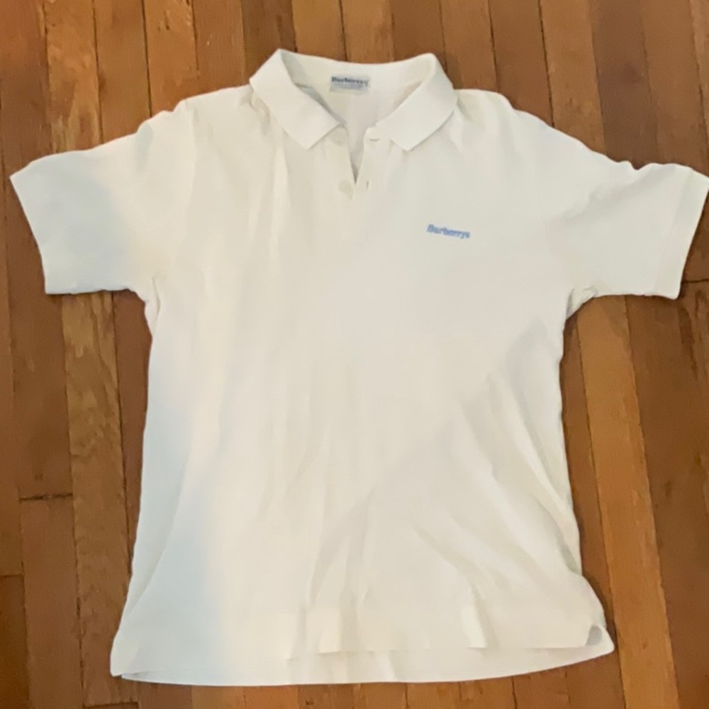 Vintage Burberry White Polo Shirt with Classic Collar and Subtle Pattern